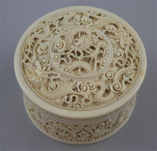 A Chinese ivory dragon drum shaped box and cover, early 20th century, diam. 10.5cm